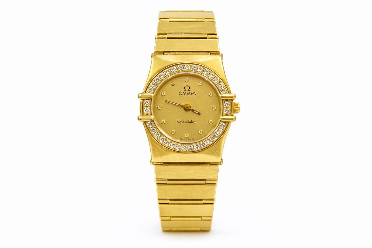Montre Omega Constellation en or jaune et diamants - Seconde main