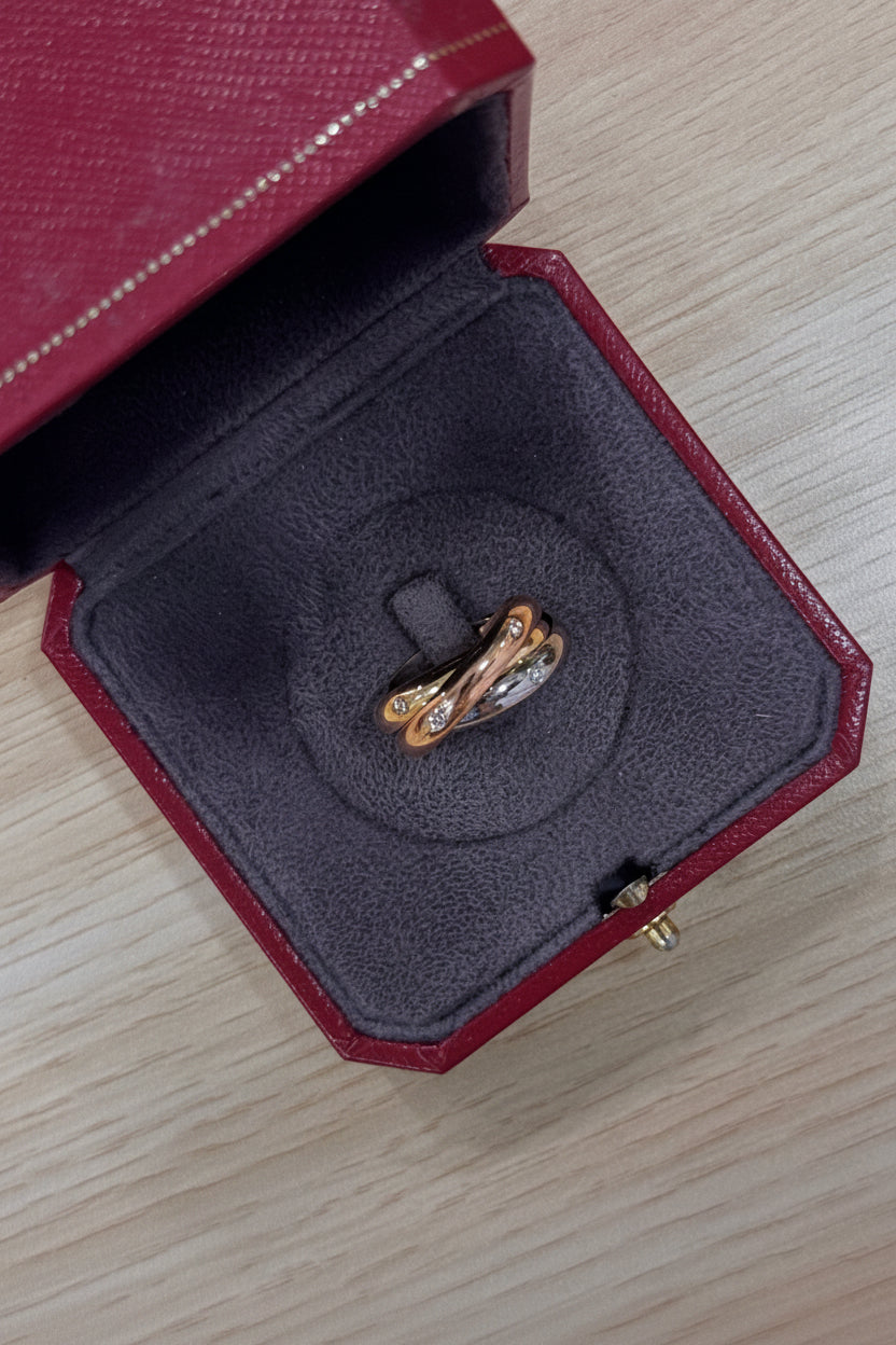 Bague Cartier Trinity trois or seconde main